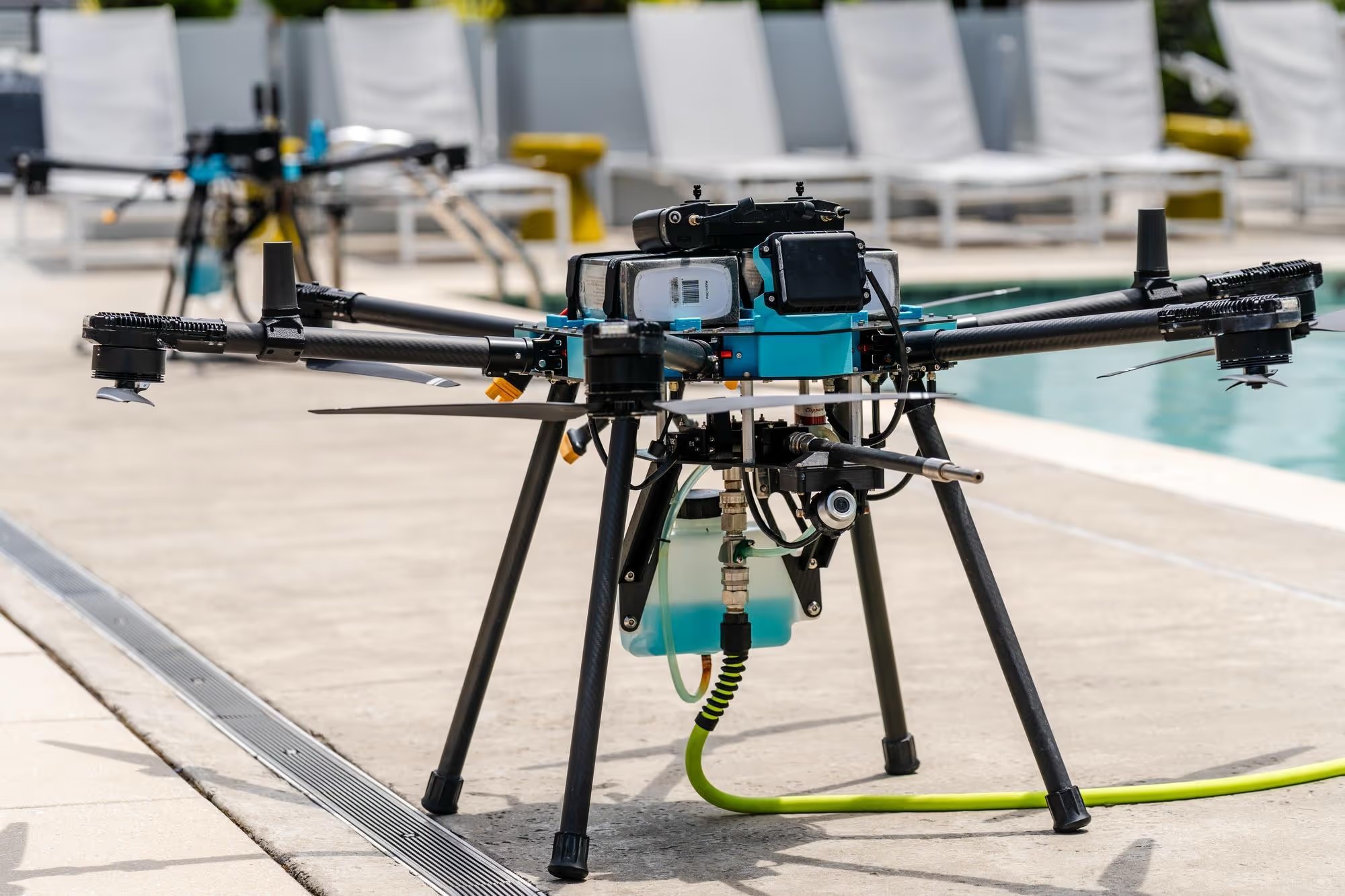Platinum cleaning drone ready on a pool deck